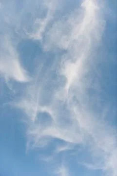 Wispy clouds in sky Stock Photos