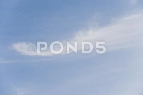 Wispy clouds in sky Stock Photos