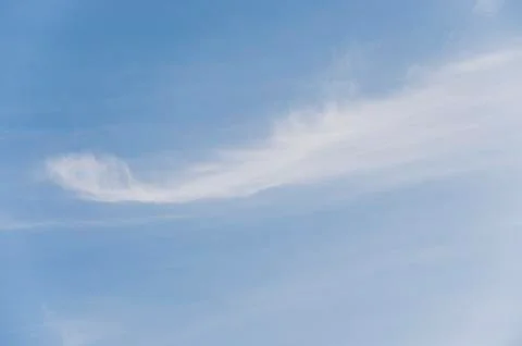 Wispy clouds in sky Stock Photos
