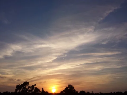 Wispy, Colorful Sunset Time lapse (2160p 29.97) Stock Footage 70600917