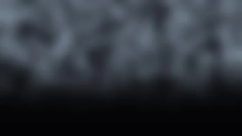 Wispy smoke particles drift across a dark background with subtle cinematic .. Stock Footage 342522522