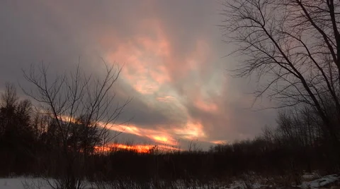 Wispy Sunset with Rays of light Timelapse Stock Footage 46487535