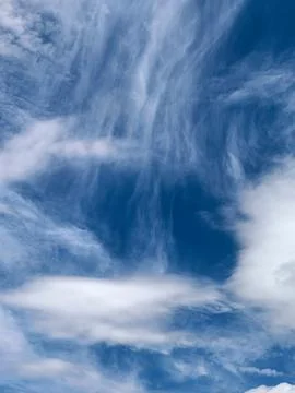 Wispy White Clouds Forming Abstract Sky Pattern Stock Photos