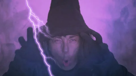 Witch casting spells with thunderstorm and lightning strikes effects Stock Footage 285119841