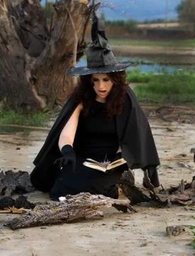 Witch conjures Stock Photos