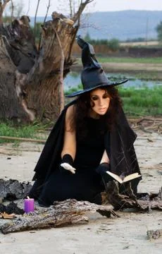 Witch conjures Stock Photos
