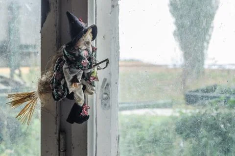 Witch doll window Stock Photos