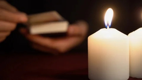 Witch is fortune teller in black mantle shows tarot card of 19 Arcana: The Sun. Stock Footage 117806021