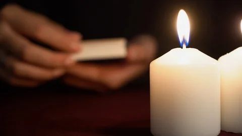 A witch is fortune teller in mantle shows tarot card of 16 Arcana: The Tower. Stock Footage 117805979