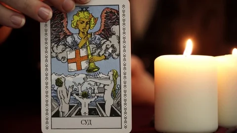 A witch is fortune teller show tarot card. Esoteric and divination concept. Stock Footage 108013598
