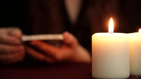 A witch is fortune teller shows tarot card on table. Divination concept. Stock Footage 108013482