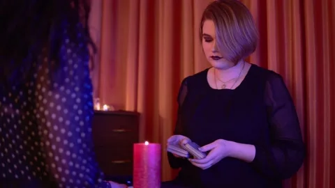 Witch future teller with tarot card esoteric palmistry concept magic ritual Stock Footage 134068272