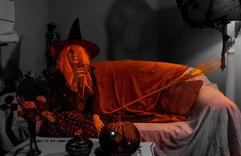 Witch with Halloween Pumpkin Doing Magic Stock Photos