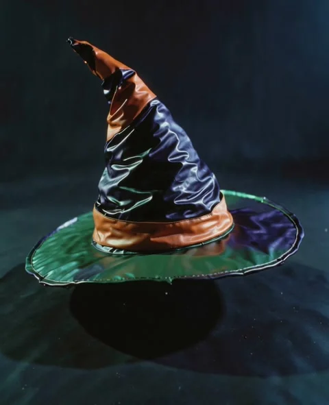 Witch hat floating in dark fantasy style. Magical wizard accessory. Stock Footage 340198424