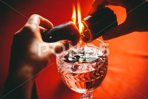 Witch holds candle divination Stock Photos