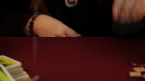 Witch performs rite of black magic. Pendulum say No. Magical ritual. Divination. Stock Footage 108013375