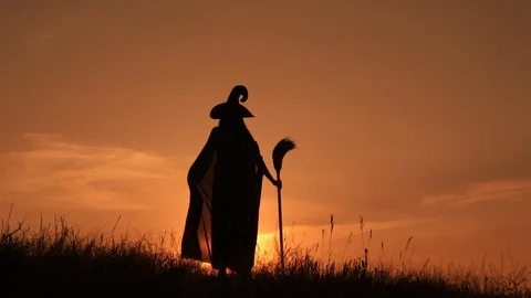 The witch performs a ritual dance at sunset Stock Footage 112529624