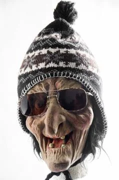 Witch rubber mask with cap Foto stock
