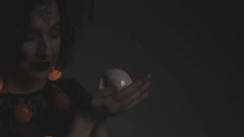 Witch Rubbing A White Skull Stock Footage 226476261