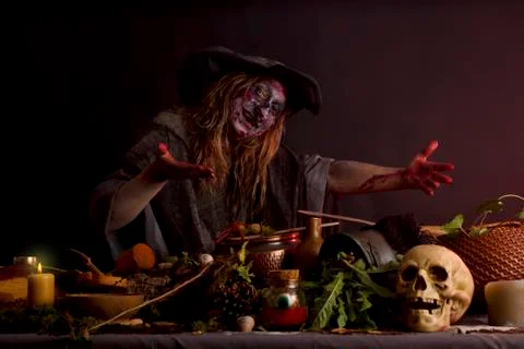 Witch shows her witch's kitchen 스톡 사진