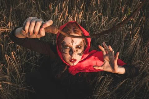 Witch with sickle Stock Photos