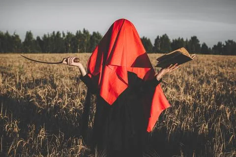 Witch with sickle Stock Photos