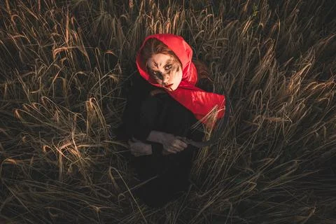 Witch with sickle Stock Photos