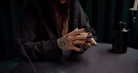 Witch spreading tarot cards during ritual Stock Footage 319596578