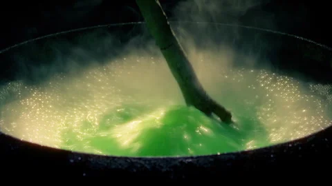 Witch Stirs Large Bubbling Cauldron Stock Footage 293022079