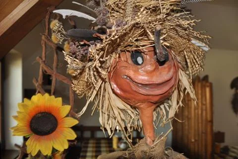 Witch with sunflower Stock Photos