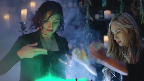 Witches Create Magic Potions in a Cauldron and Cast Spells Stock Footage 206569001