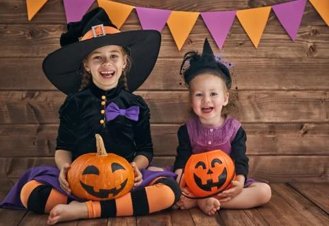 Witches with pumpkins Stock Photos