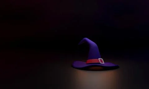 The witch's hat on a black background represents the spooky, magical, and m.. Stock Photos