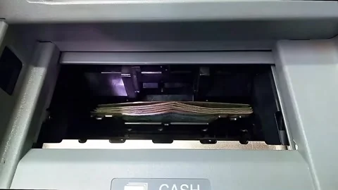 Withdraw Money from ATM machine Stock Footage 311300356