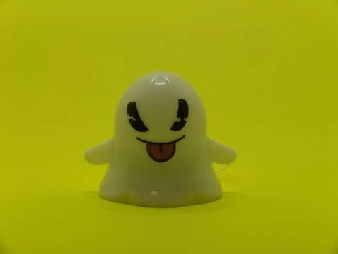 Withe gost  - yellow backgroud Stock Photos