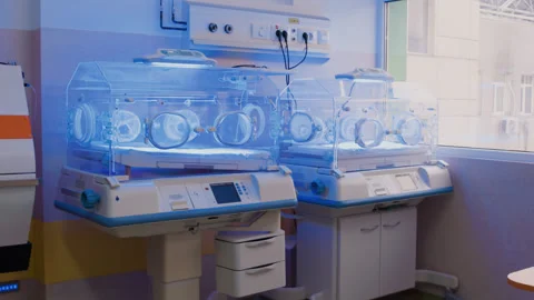 Within hospitals nursery array of incubator for newborn cradle premature babies. Stock Footage 270470306