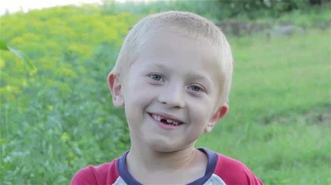 Without teeth smiling boy Video stock 59513571