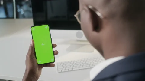 Without touching. Green Screen and Chroma Key of Smartphone. Businessman Using Stock Footage 194009720