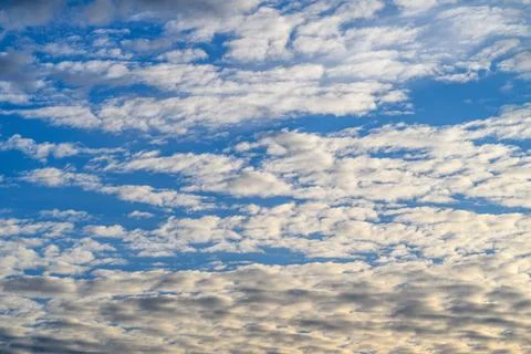 Witness the Stunning Cloud Patterns Found in a Bright and Expansive Blue Sky Tod Stock Photos