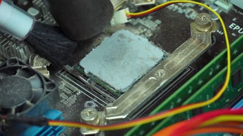 The wizard cleans the computer processor from dust. Stock Footage 130809176