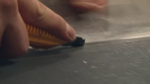 The wizard inserts the mosquito net in the frame for the window Stock Footage 75156885