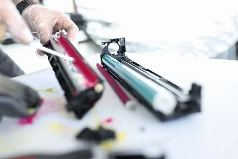 Wizard makes ink replacements in printer cartridge Stock Photos