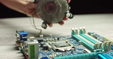 The wizard removes CPU cooling for diagnostics. Repair and maintenance of Stock Footage 144895829