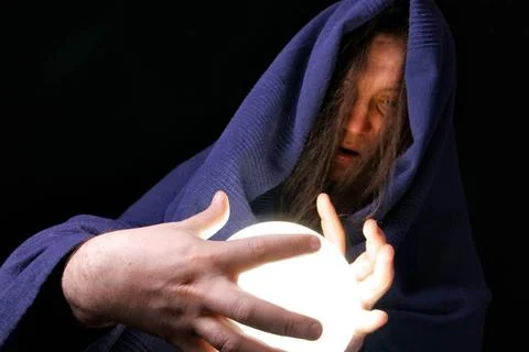 Wizard Wizard with glowing magical orb close-up ,model released, Symbolfot... Stock-Fotos