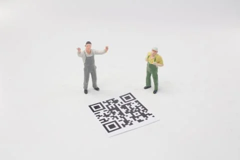 A wmini worker with 2D bar code Foto stock