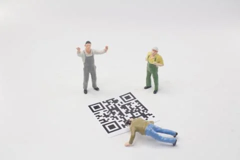 A wmini worker with 2D bar code Stock Photos