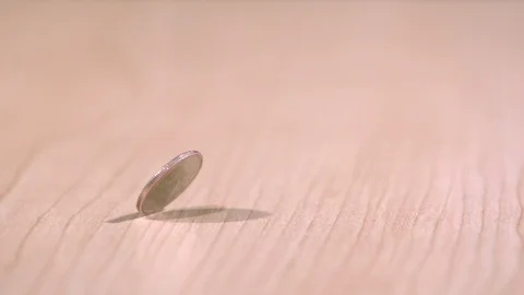 Wobbling dime Stock Footage 93788931