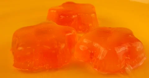 Wobbly jelly after hitting with a spoon.  Stock-Footage 219969575