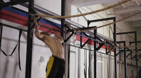 Wod functional training - young man doing burpees and deadlift Stock Footage 65280174