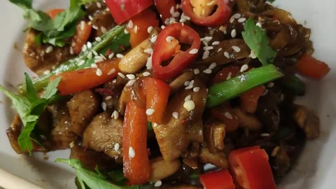 Wok with chicken and vegetables Stock Footage 221308217